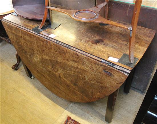 Oval oak drop leaf table